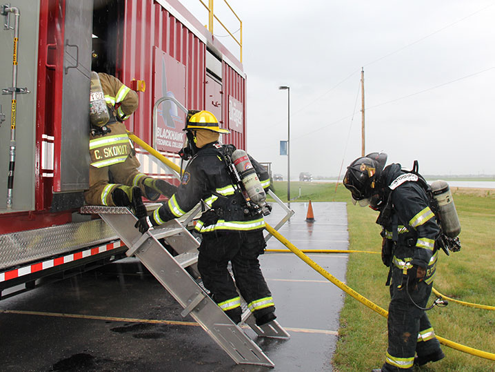 firefighter students training outside