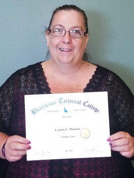 Lynette Mattson holding diploma