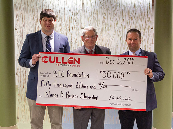 JP Cullen and BTC President holding donation check