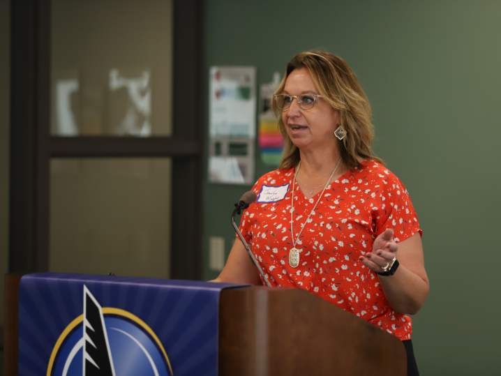 featured speaker Jennifer Murphy addressing event attendees