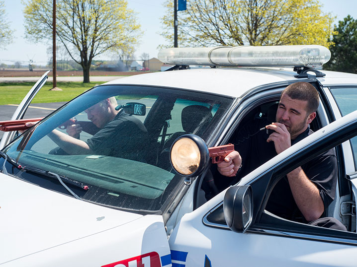 Academy Students in Police Car during Training Scenario