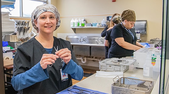 Sterile Processing Technician student in lab