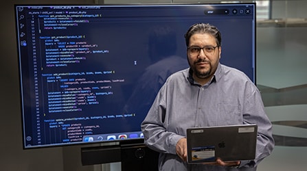 Student in classroom at computer