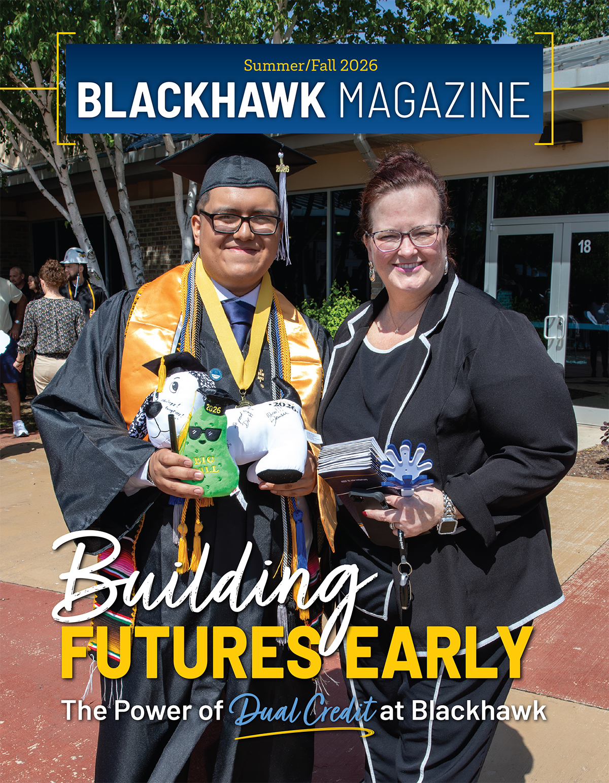 Blackhawk Magazine cover with student in graduation regalia standing with principal looking at the camera