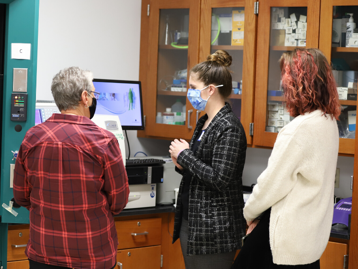 student demoing lab equipment