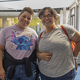 student and parent at campus registration event